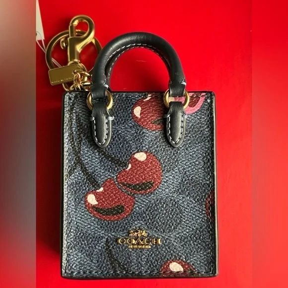 Coach Navy and Burgundy Cherry Print Key Holder - Picture 13 of 15